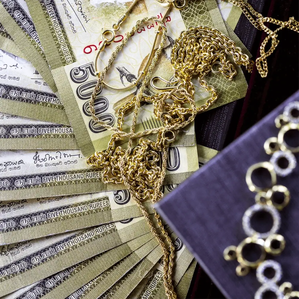 Arranged cash and gold jewellery symbolizing gold loans